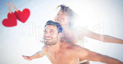 Composite image of happy couple smiling