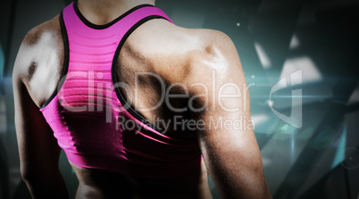 Composite image of close up of muscular woman
