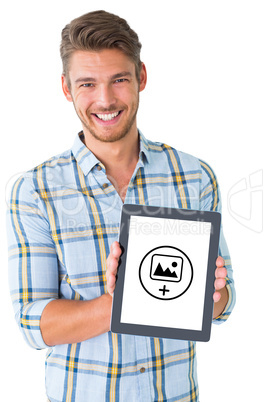 Composite image of young student showing tablet pc