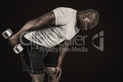 Composite image of fit man exercising with dumbbell