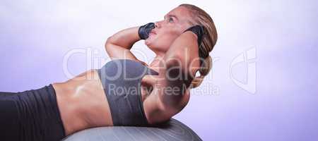 Composite image of muscular woman doing sit ups