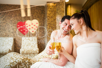 Composite image of couple relaxing in the thermal suite