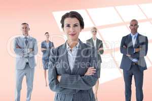 Composite image of businesswoman colleagues arm crossed