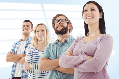 Composite image of smiling business people standing in row with