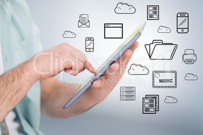 Composite image of man using tablet pc