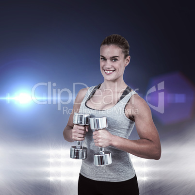 Composite image of  muscular woman working out with dumbbells