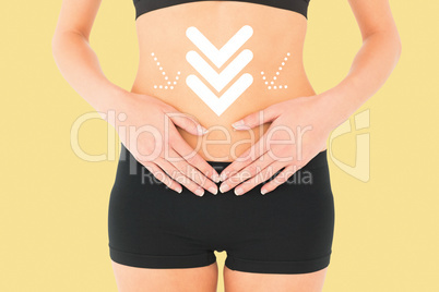 Composite image of closeup mid section of a fit woman with stoma