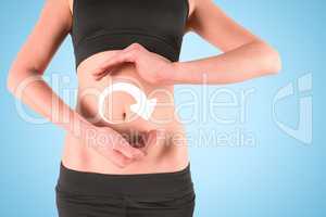 Composite image of woman with hands over belly