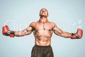 Composite image of boxer with arms outstretched