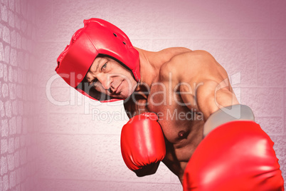 Composite image of portrait of boxer with gloves punching agains