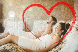 Composite image of man and woman lying down together