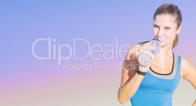 Composite image of fit woman with water