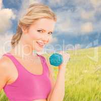 Composite image of happy fit woman