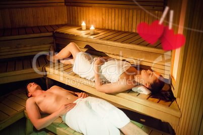 Composite image of couple relaxing in the sauna