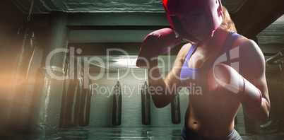 Composite image of portrait of female fighter with fighting stance