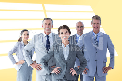 Composite image of business colleagues standing in a row