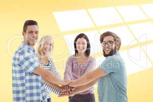 Composite image of portrait of smiling business people putting t