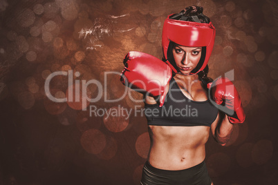 Composite image of portrait of pretty boxer with fighting stance