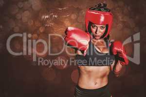 Composite image of portrait of pretty boxer with fighting stance