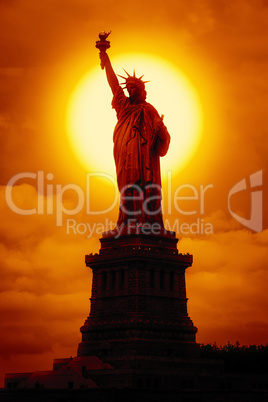 liberty statue at sunset