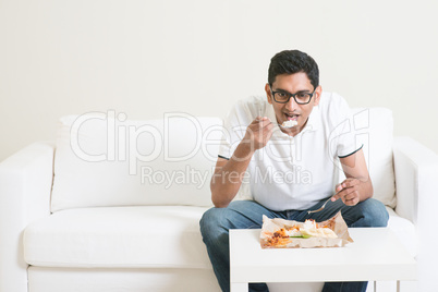 Lonely man eating food