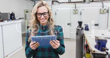 Composite image of pretty blonde with tablet