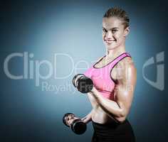 Composite image of muscular woman lifting heavy dumbbells