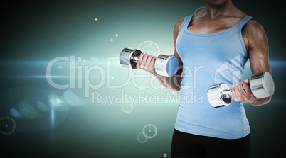 Composite image of muscular woman exercising with dumbbells