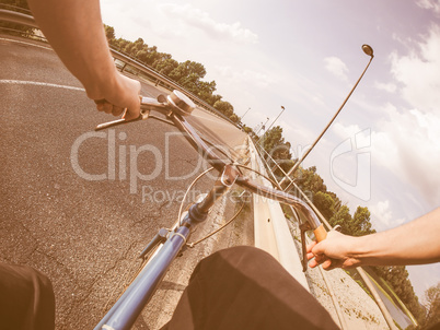 Riding a bike vintage