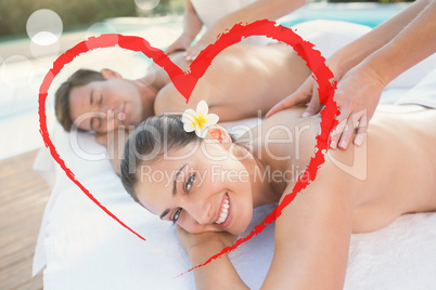 Composite image of attractive couple enjoying couples massage po