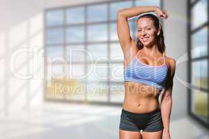 Composite image of portrait of happy female athlete with hand on
