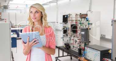 Composite image of young pretty student using tablet pc