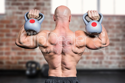 Composite image of rear view of bald man lifting kettlebells