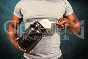 Composite image of fit man scooping protein powder