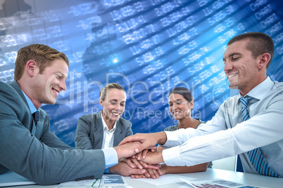 Composite image of business team celebrating a good job