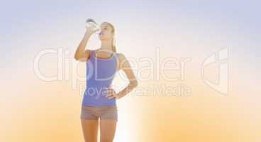 Composite image of fit woman with water