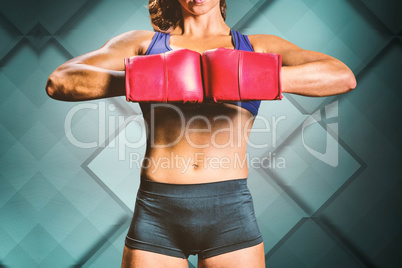 Composite image of midsection of boxer flexing stance