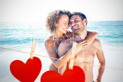 Composite image of happy couple smiling