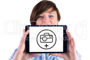 Composite image of portrait of woman showing digital tablet