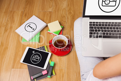 Composite image of overhead shot of woman, coffee, laptop, and t