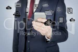 Composite image of  businessman using mobile phone