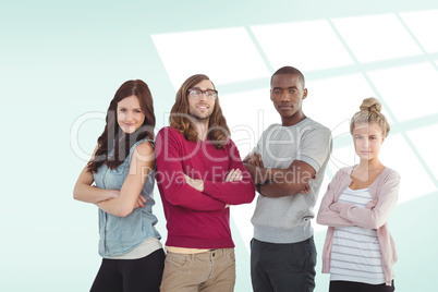 Composite image of portrait of business team with arms crossed