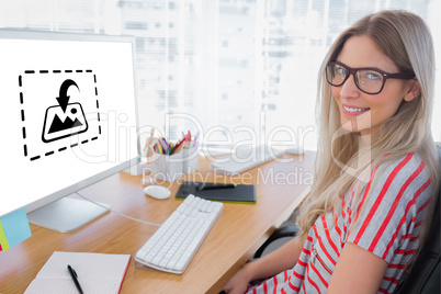 Composite image of attractive photo editor working on computer