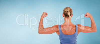 Composite image of rear view of woman flexing muscles