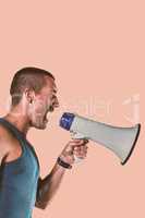 Composite image of angry male trainer yelling through megaphone