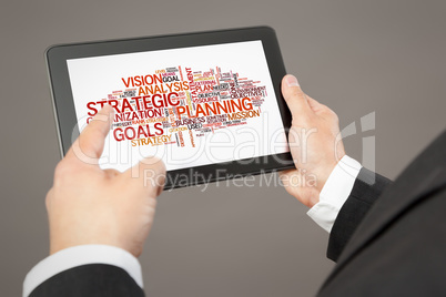 business man pointing to a tablet pc