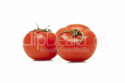 two red tomatoes on white background