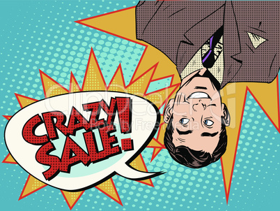 Crazy sale announcement man upside down