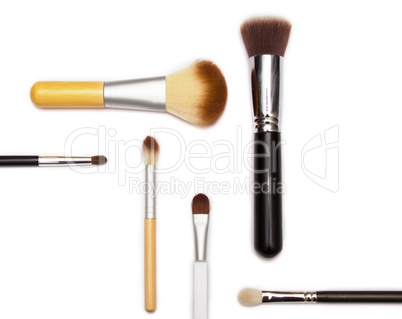 Assorted make up brushes on white background