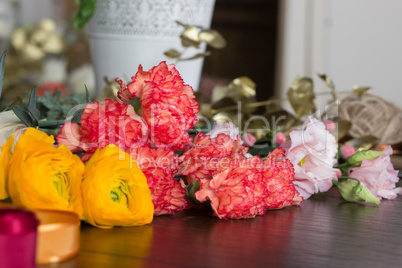 Four different types of flowers on the table